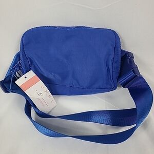 NEW Unni Blue Fanny Pack/sling Bag 8"x5"x2.25" Adjustable Strap NWT